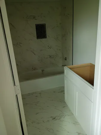 a bathroom with a bathtub