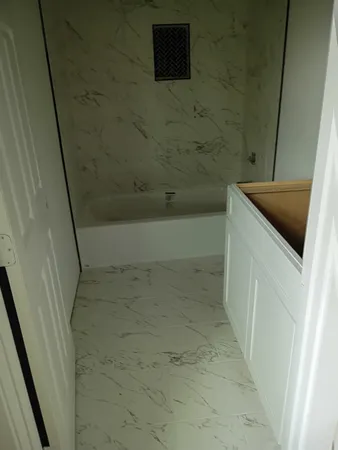 a bathroom with a bathtub