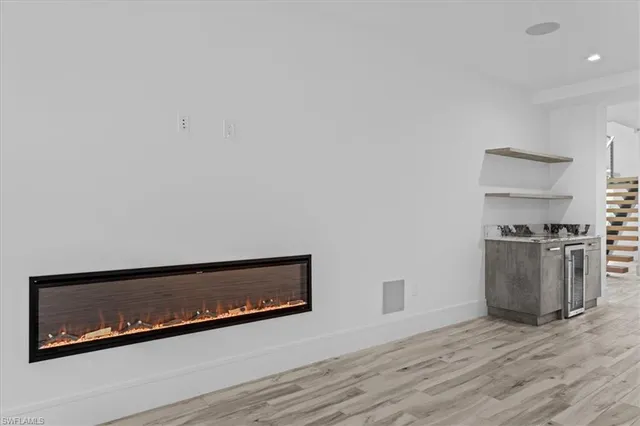 a view of workspace with wooden floor