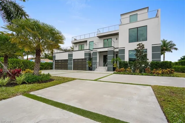 a view of a building with a yard