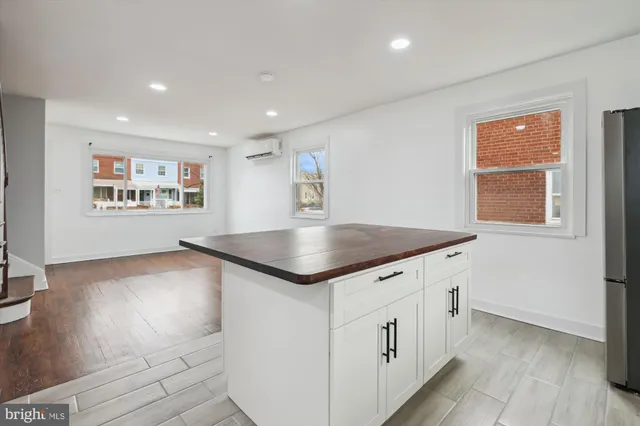 a kitchen with a sink and a window
