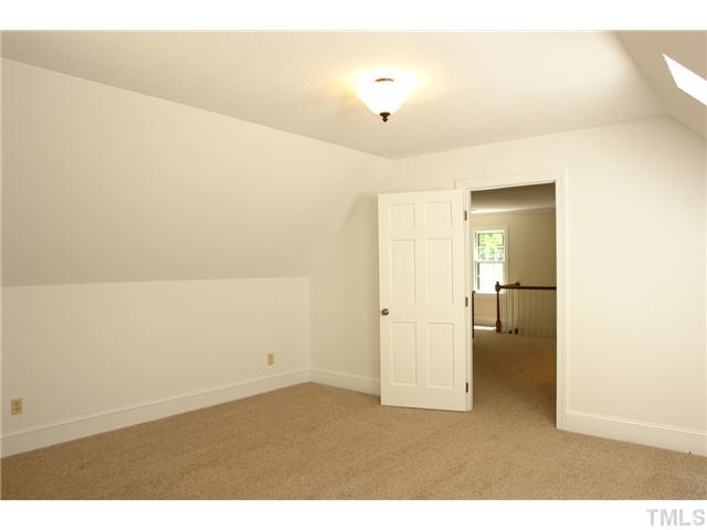 5001 Trail Ridge Drive Raleigh, NC 27613 - Photo 19 of 25 a view of an empty room