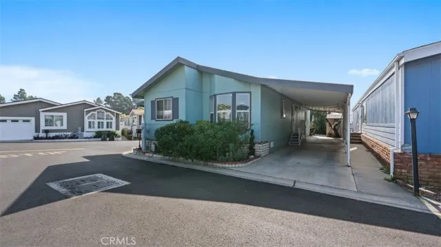 a view of a house with a street
