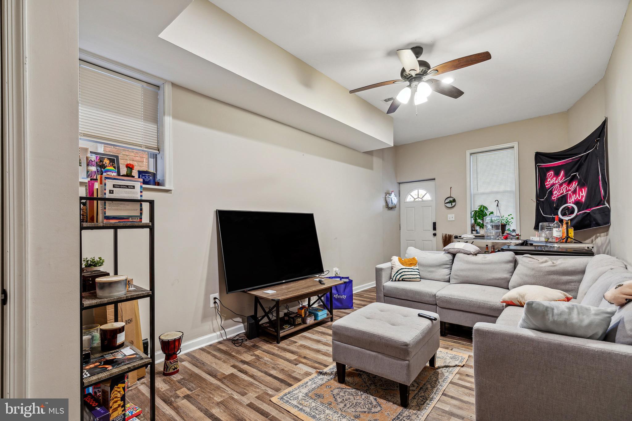 4606 York Road Baltimore, MD 21212 - Photo 11 of 33 a living room with furniture and a flat screen tv
