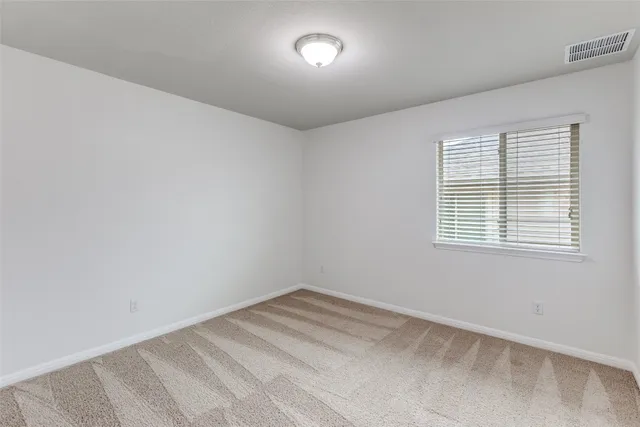 a view of a room with a window