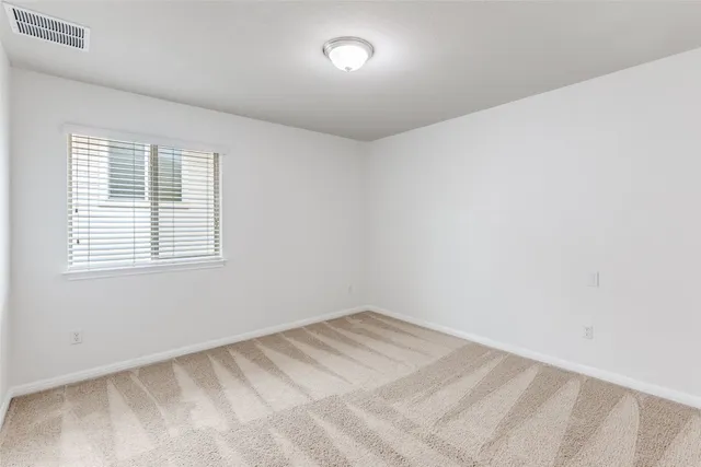 a view of a room with a window