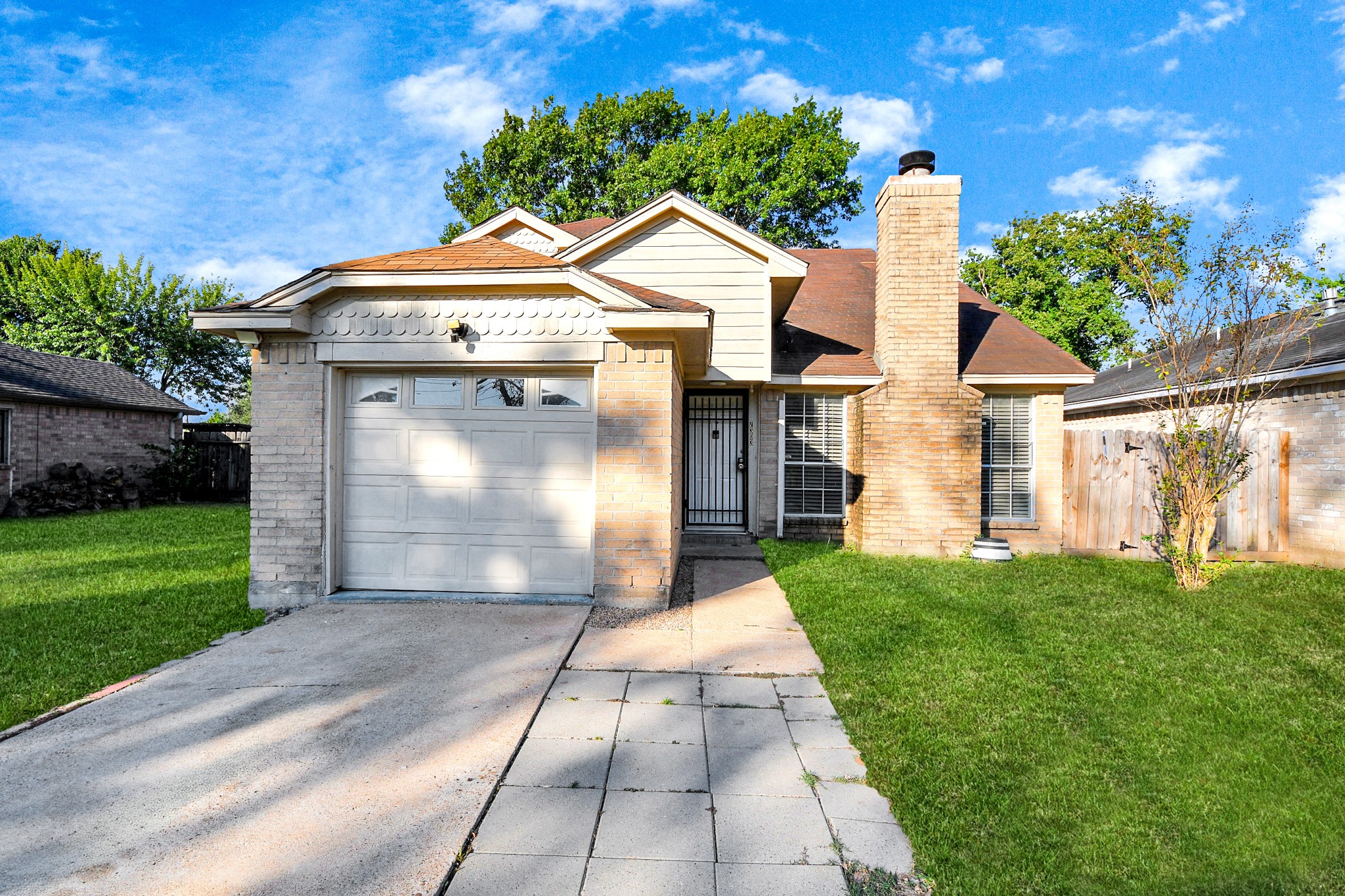 a front view of a house with yard
