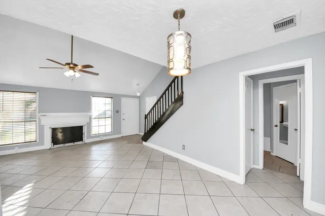 a view of entryway and hall with a window