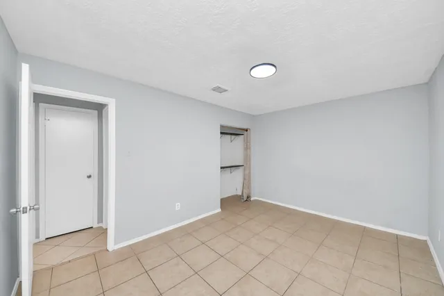 a bathroom with a sink toilet and a mirror