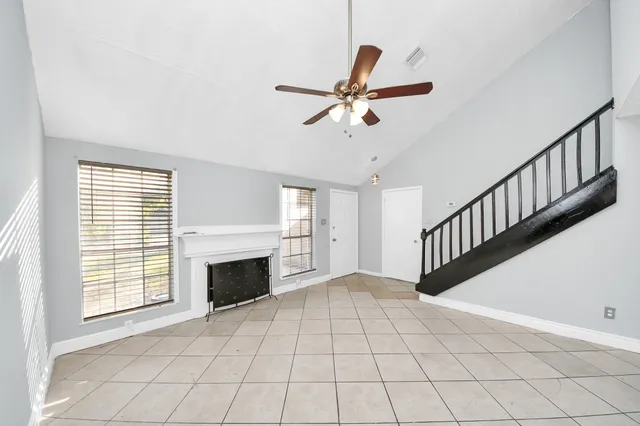 a view of a kitchen with a sink and a stove top oven