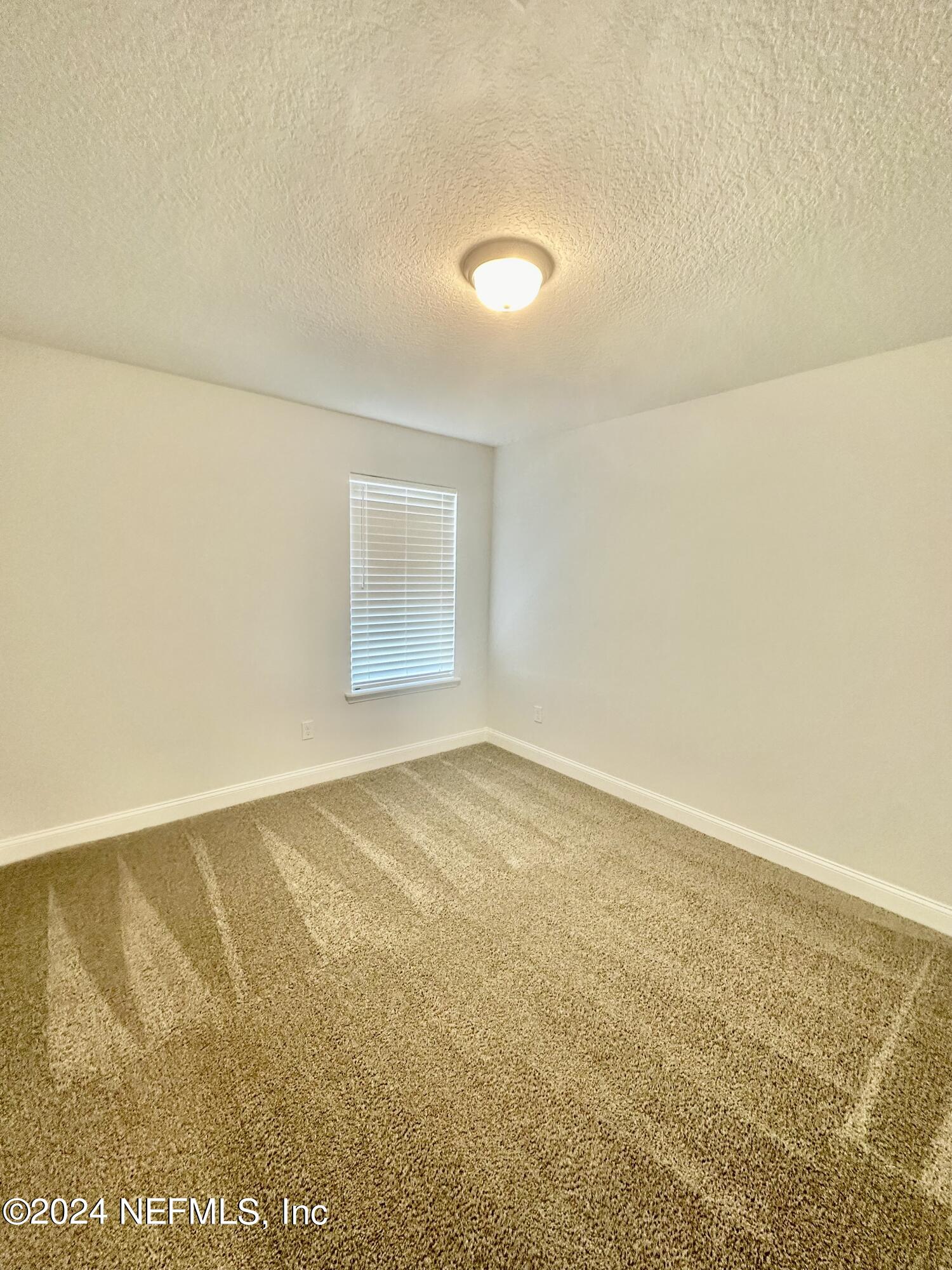 236 Wildlight Avenue Yulee, FL 32097 - Photo 3 of 10 an empty room