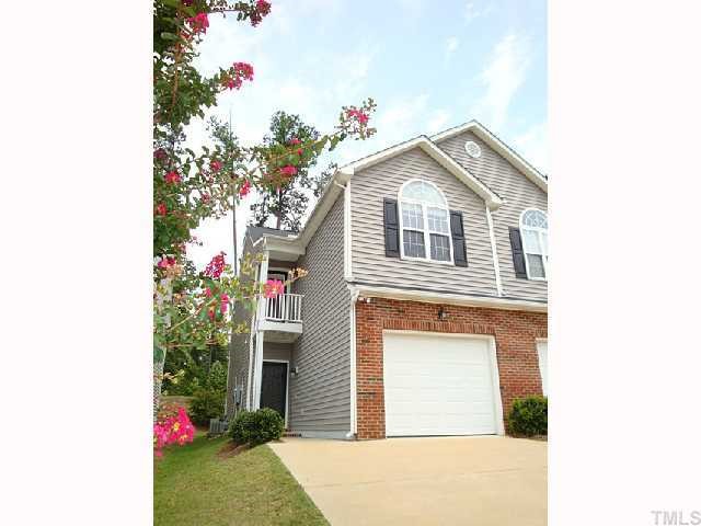2320 Persimmon Ridge Drive Raleigh, NC 27604 - Photo 1 of 11 a front view of a house with plants