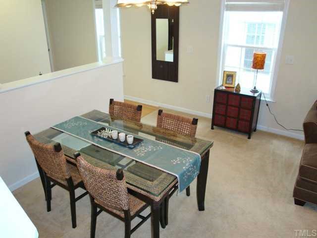 2320 Persimmon Ridge Drive Raleigh, NC 27604 - Photo 5 of 11 a view of a dining room with furniture and wooden floor