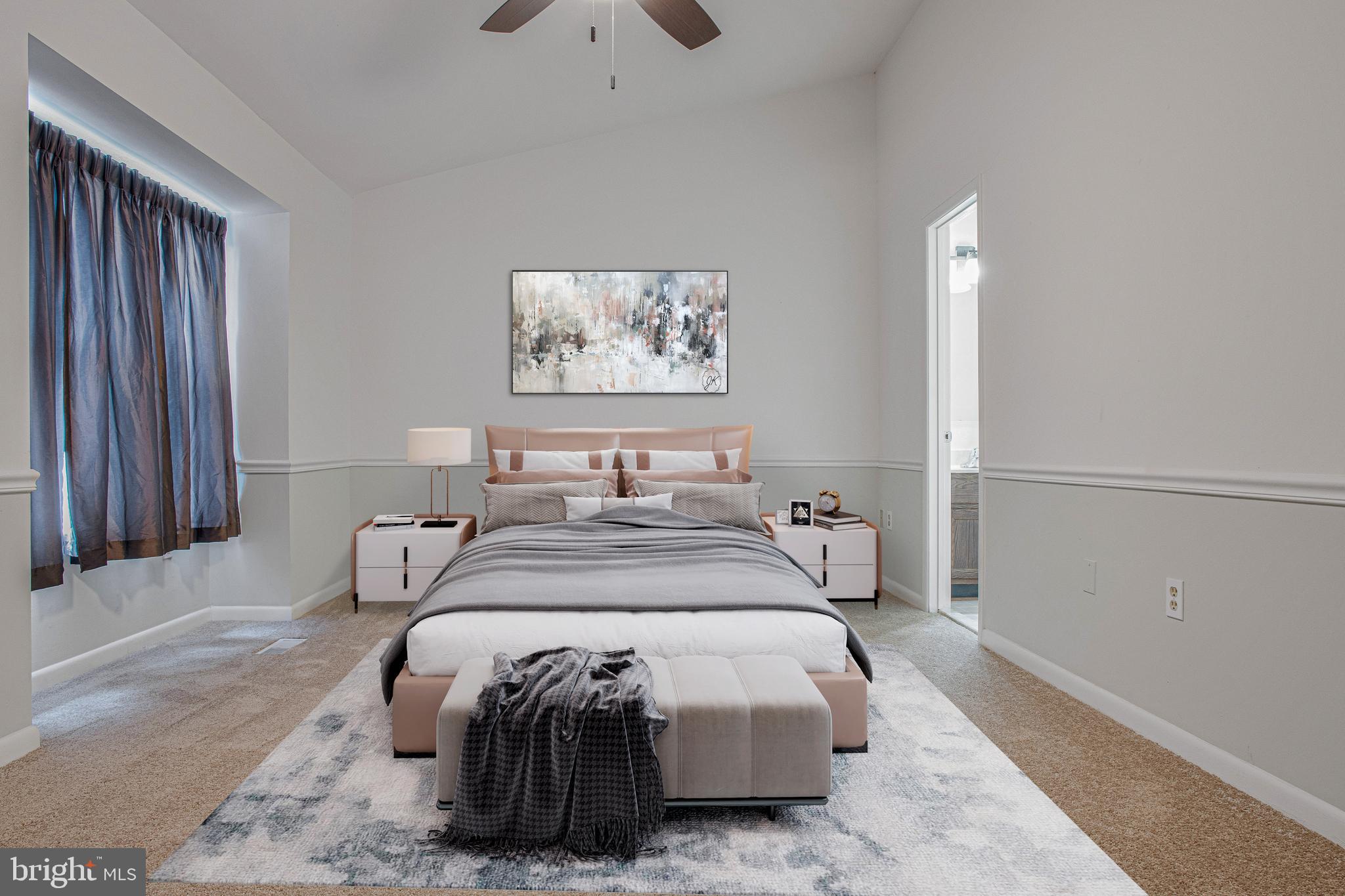 2830 Schoolhouse Circle Silver Spring, MD 20902 - Photo 22 of 58 a bedroom with a bed and a window