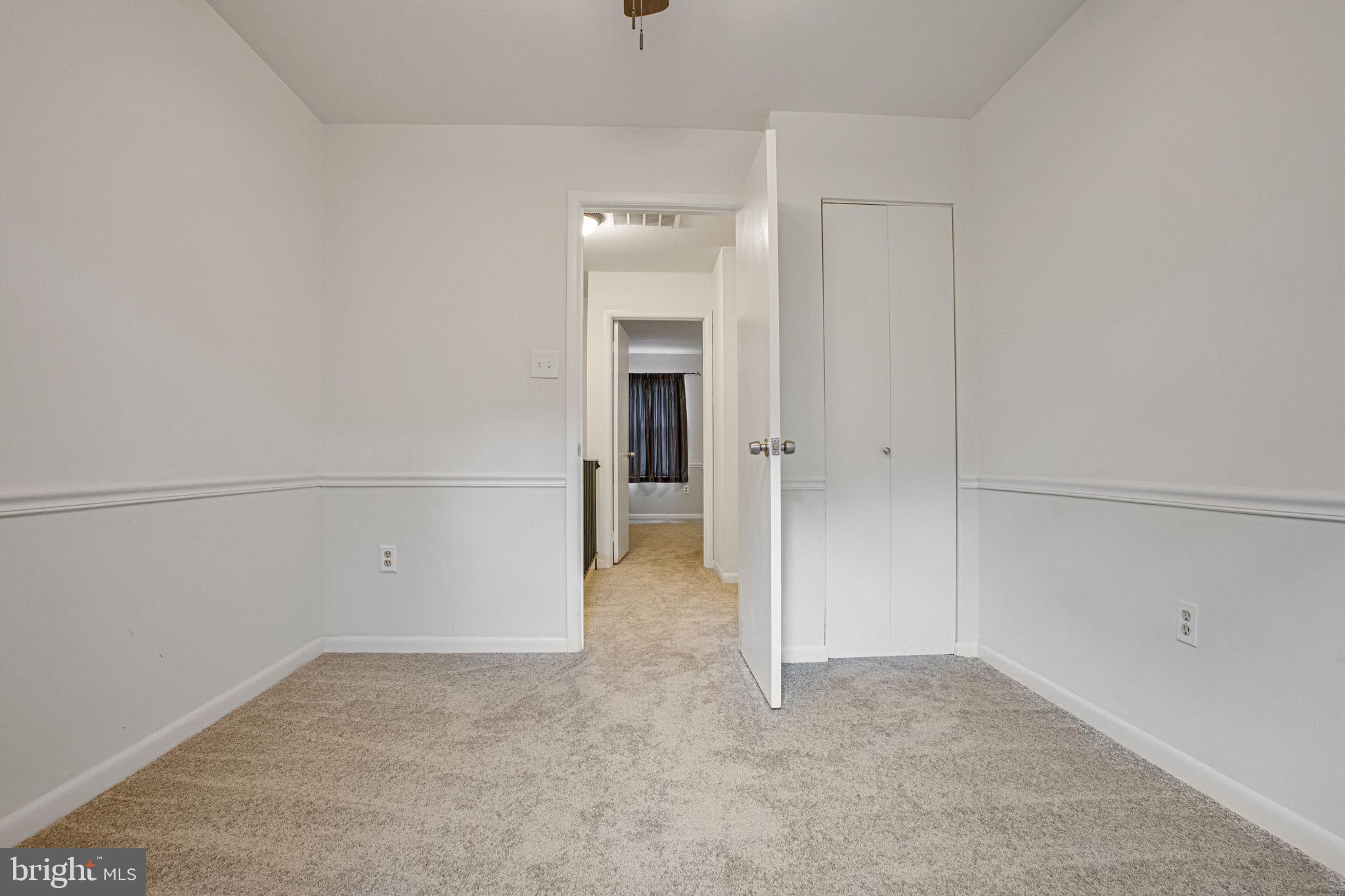 2830 Schoolhouse Circle Silver Spring, MD 20902 - Photo 31 of 58 a view of an empty room