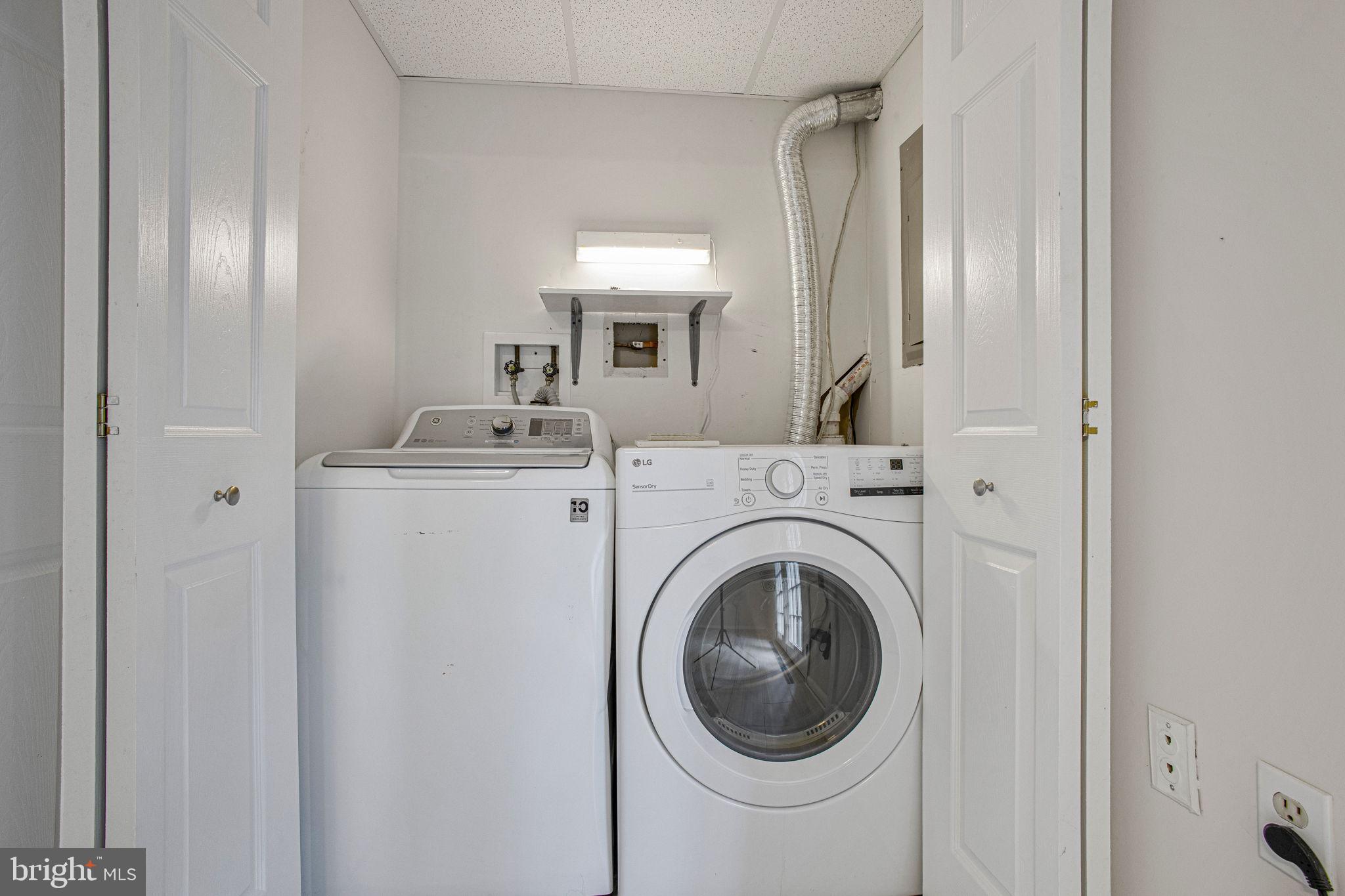 2830 Schoolhouse Circle Silver Spring, MD 20902 - Photo 40 of 58 a utility room with dryer and washer