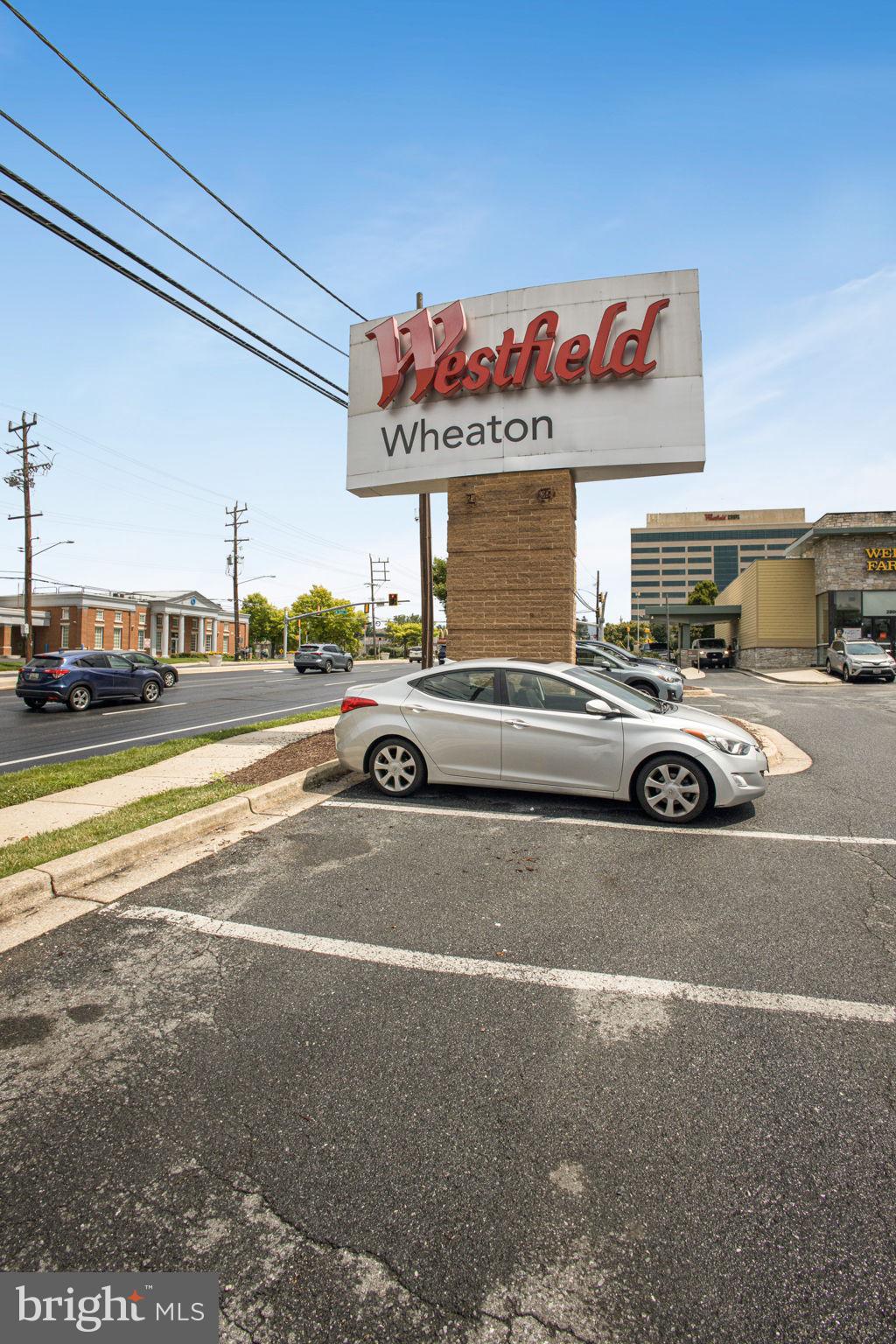 2830 Schoolhouse Circle Silver Spring, MD 20902 - Photo 57 of 58 a view of a cars park in front of a building