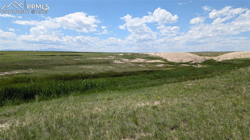 7995 Cowboy Rnch View Peyton, CO 80831 - Photo 8 of 24 a view of lake with mountain