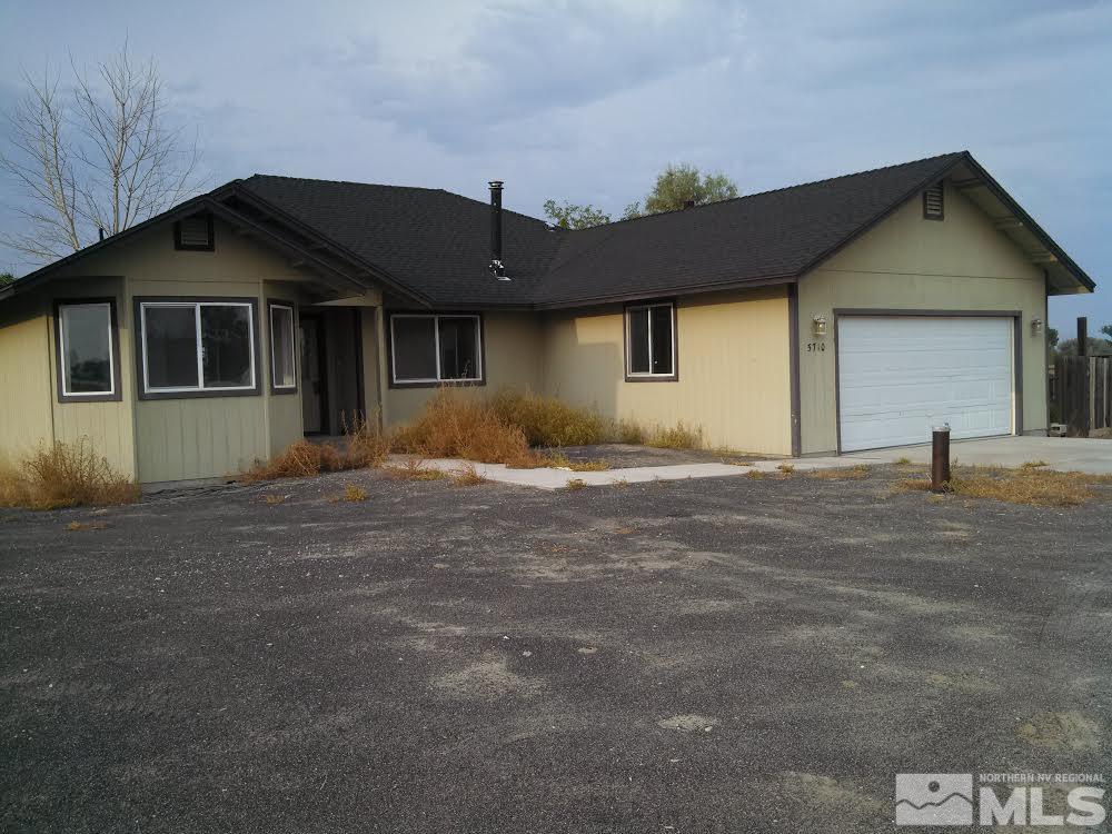 5710 Workman Road Fallon, NV 89406 - Photo 1 of 1 a front view of a house with a yard