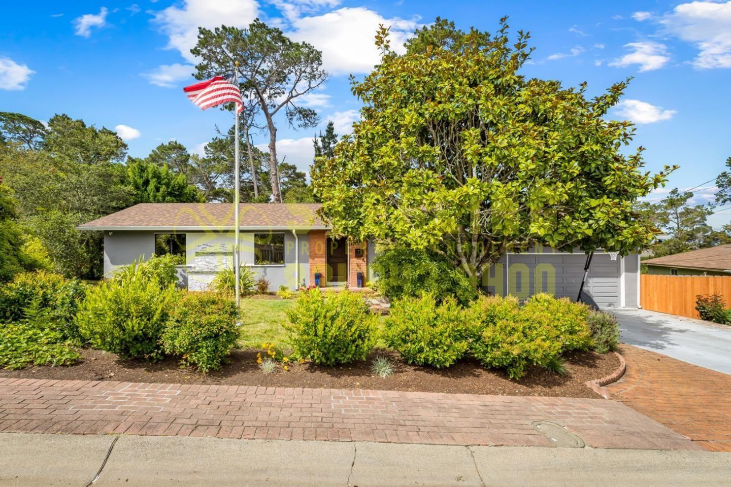 2040 Marsala Circle Monterey, CA 93940 - Photo 2 of 42 a front view of a house with a yard