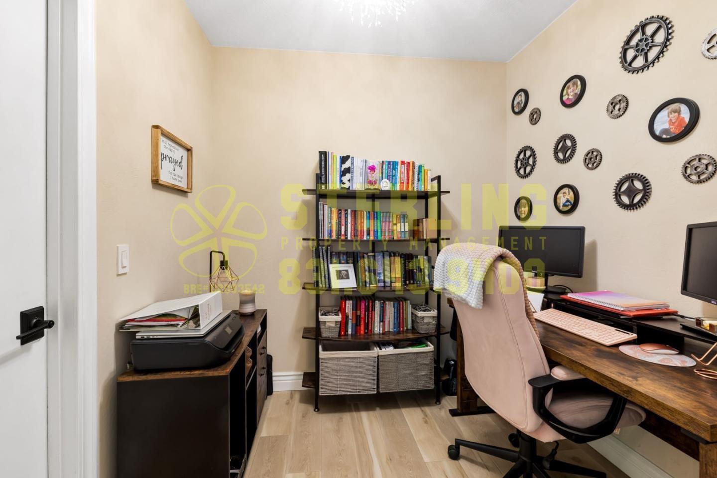 2040 Marsala Circle Monterey, CA 93940 - Photo 24 of 42 a view of a workspace with furniture and wooden floor