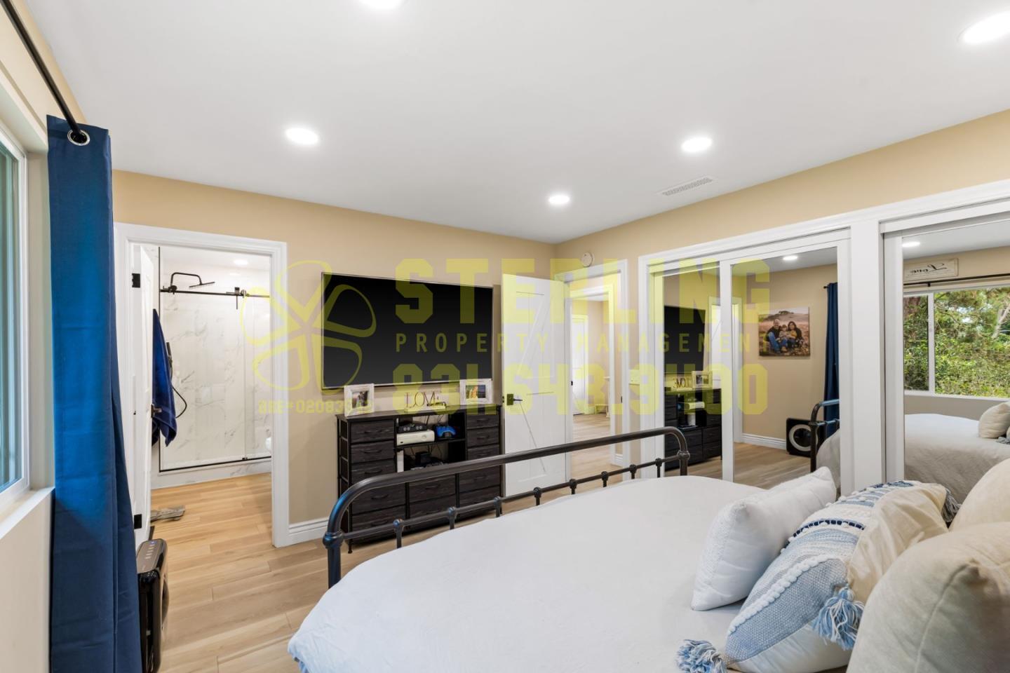 2040 Marsala Circle Monterey, CA 93940 - Photo 28 of 42 a spacious bedroom with a bed and glass door