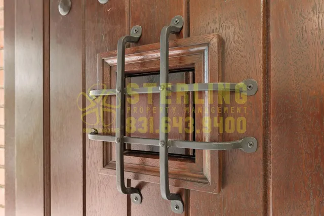 a living room with furniture fireplace and kitchen view