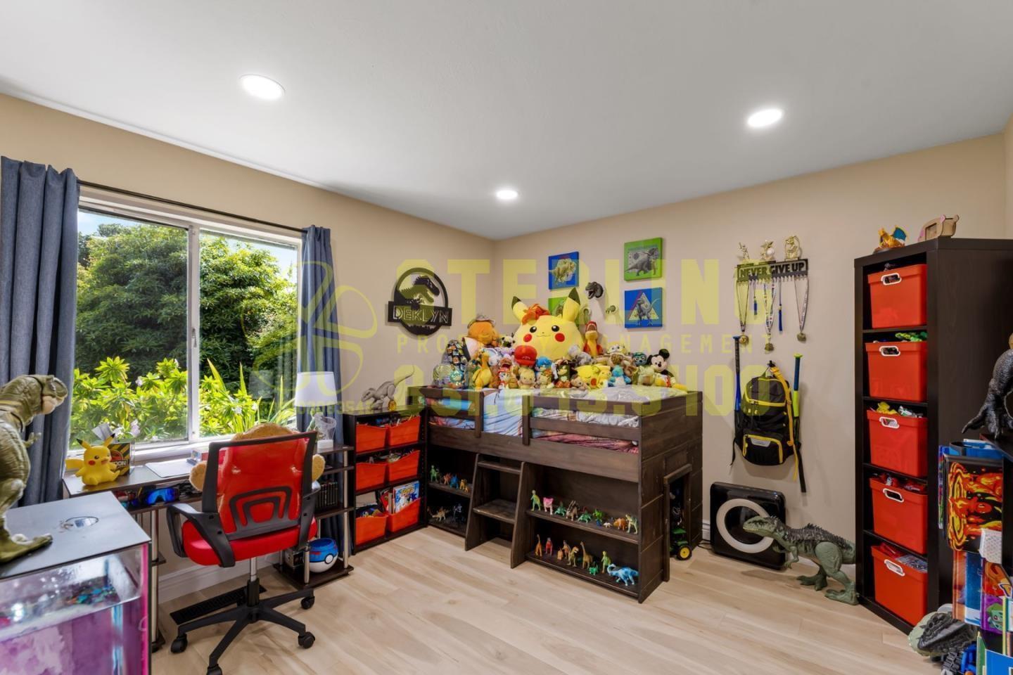 2040 Marsala Circle Monterey, CA 93940 - Photo 33 of 42 a living room filled with furniture and a window