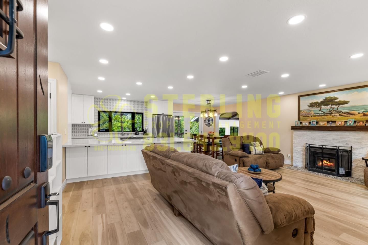 2040 Marsala Circle Monterey, CA 93940 - Photo 4 of 42 a living room with furniture fireplace and kitchen view