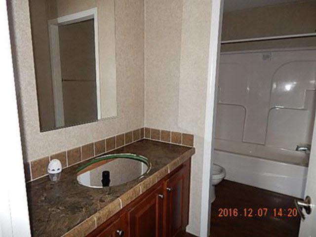 42 Chapman Road Atmore, AL 36502 - Photo 8 of 14 Hall Bathroom