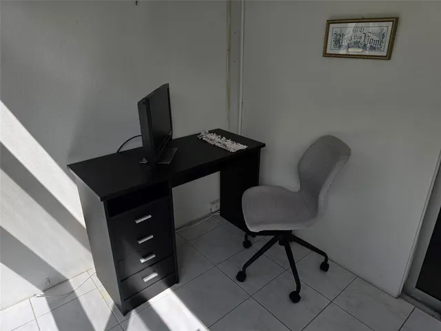 a chair and a table in a room