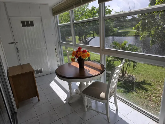 a outdoor dining space with furniture