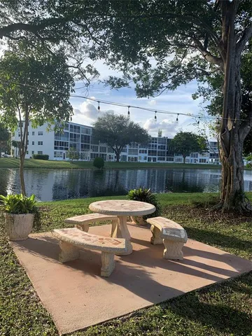 a view of a yard with a patio