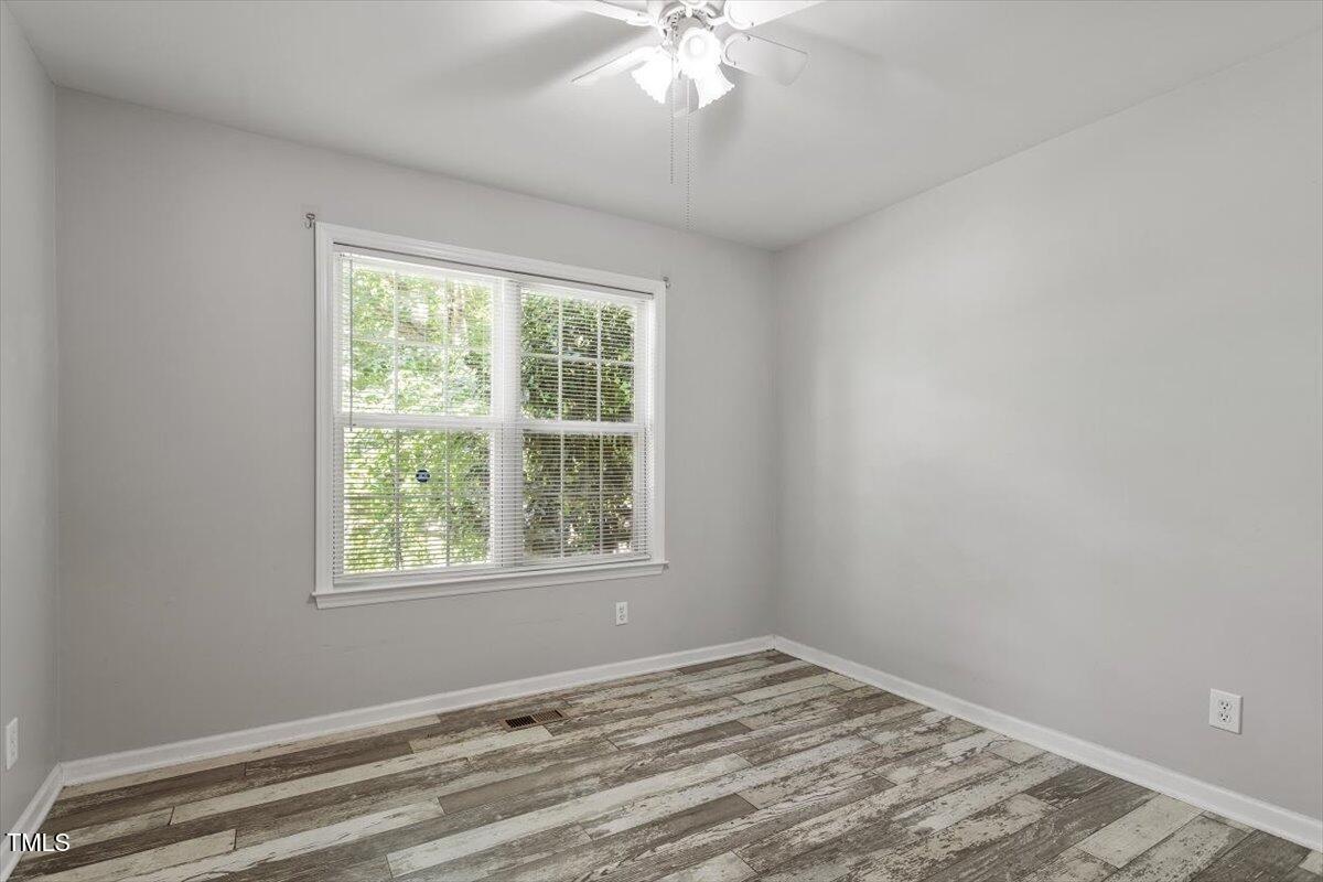 212 Webfoot Drive Garner, NC 27529 - Photo 20 of 26 an empty room with a window