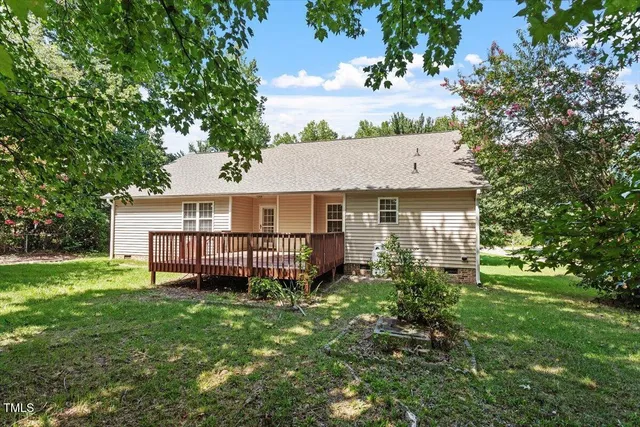 front view of a house with a big yard