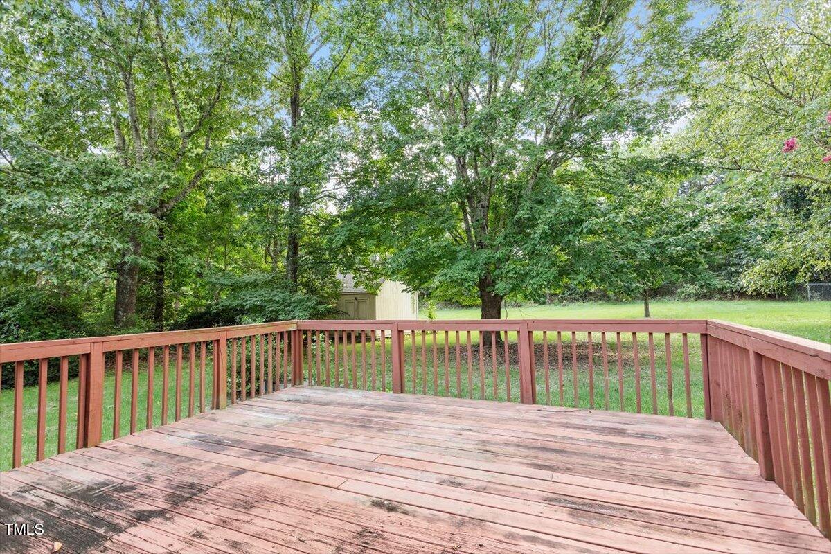 212 Webfoot Drive Garner, NC 27529 - Photo 25 of 26 a view of a wooden deck