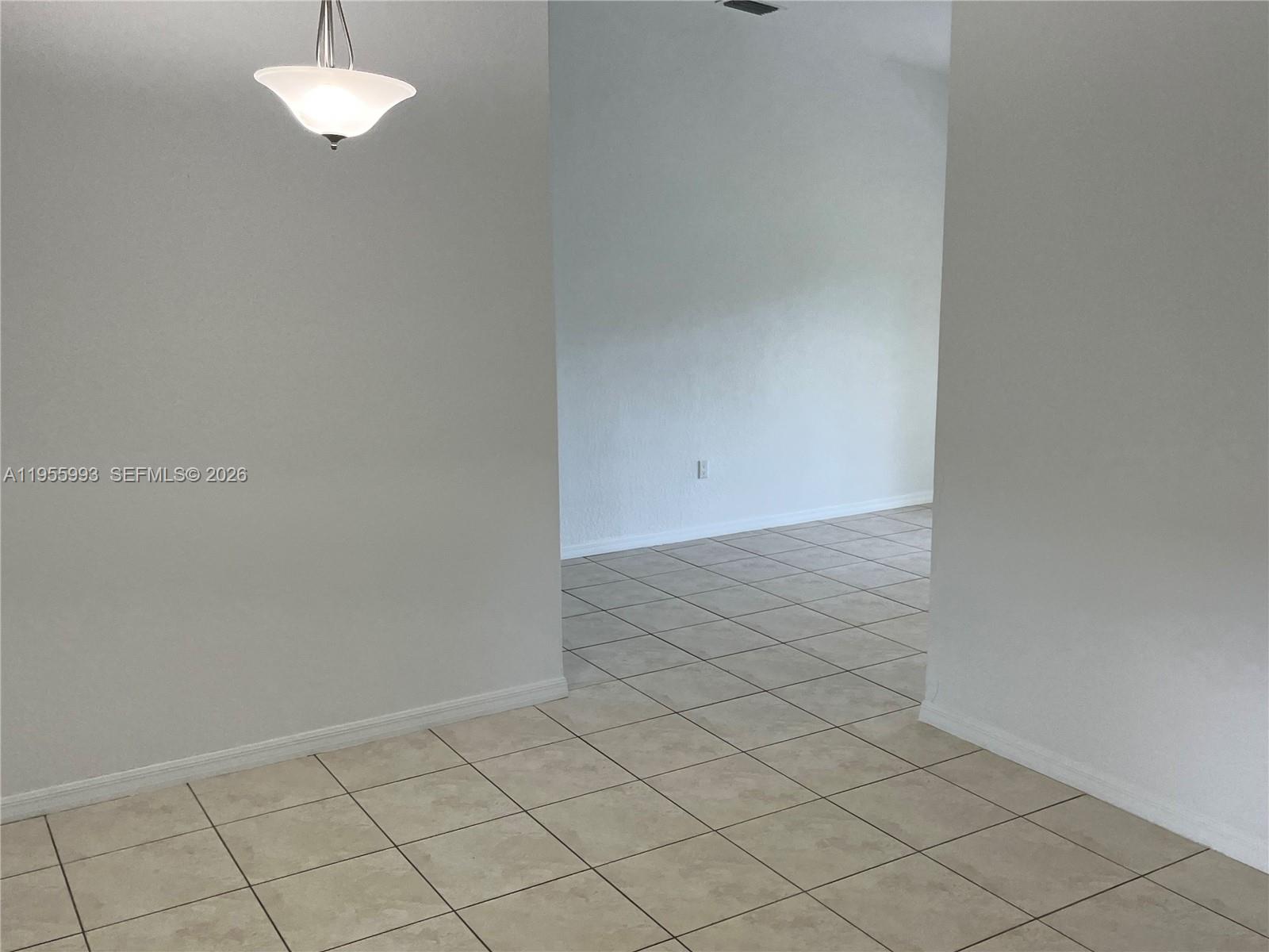 12997 Southwest 219th Terrace, Unit 12997 Miami, FL 33170 - Photo 11 of 24 a view of empty room