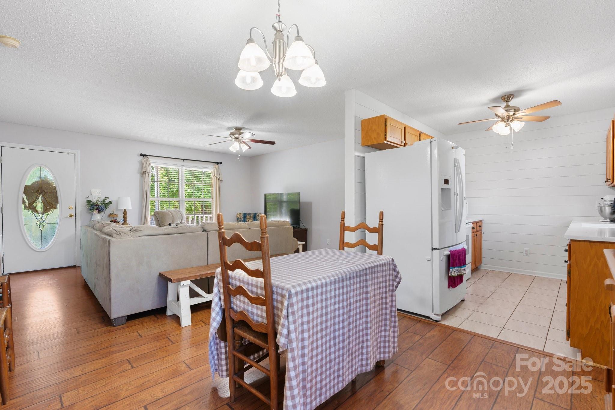 5184 Swinging Bridge Road Conover, NC 28613 - Photo 11 of 38 a living room with furniture and a wooden floor
