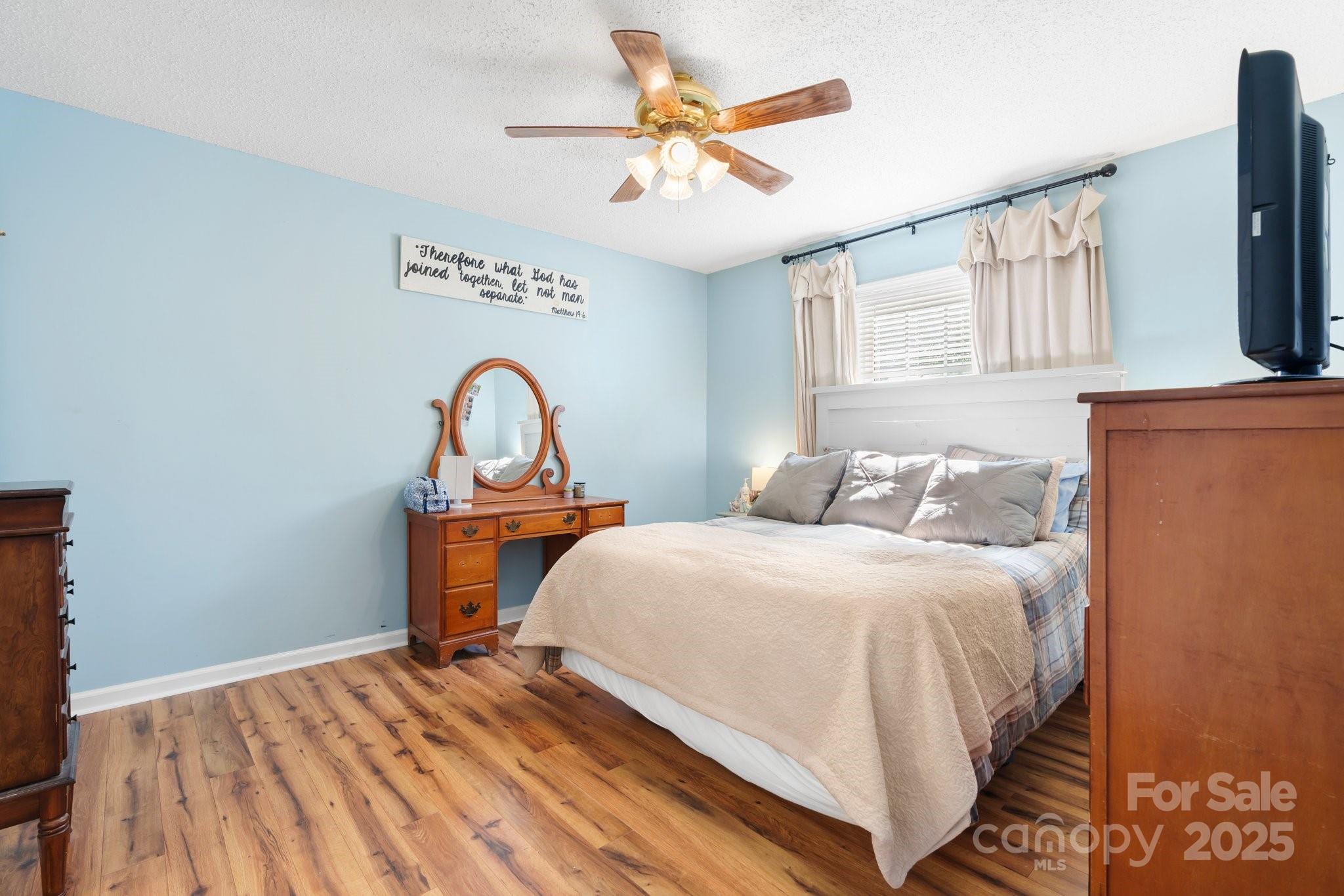 5184 Swinging Bridge Road Conover, NC 28613 - Photo 12 of 38 a bedroom with a bed and a window