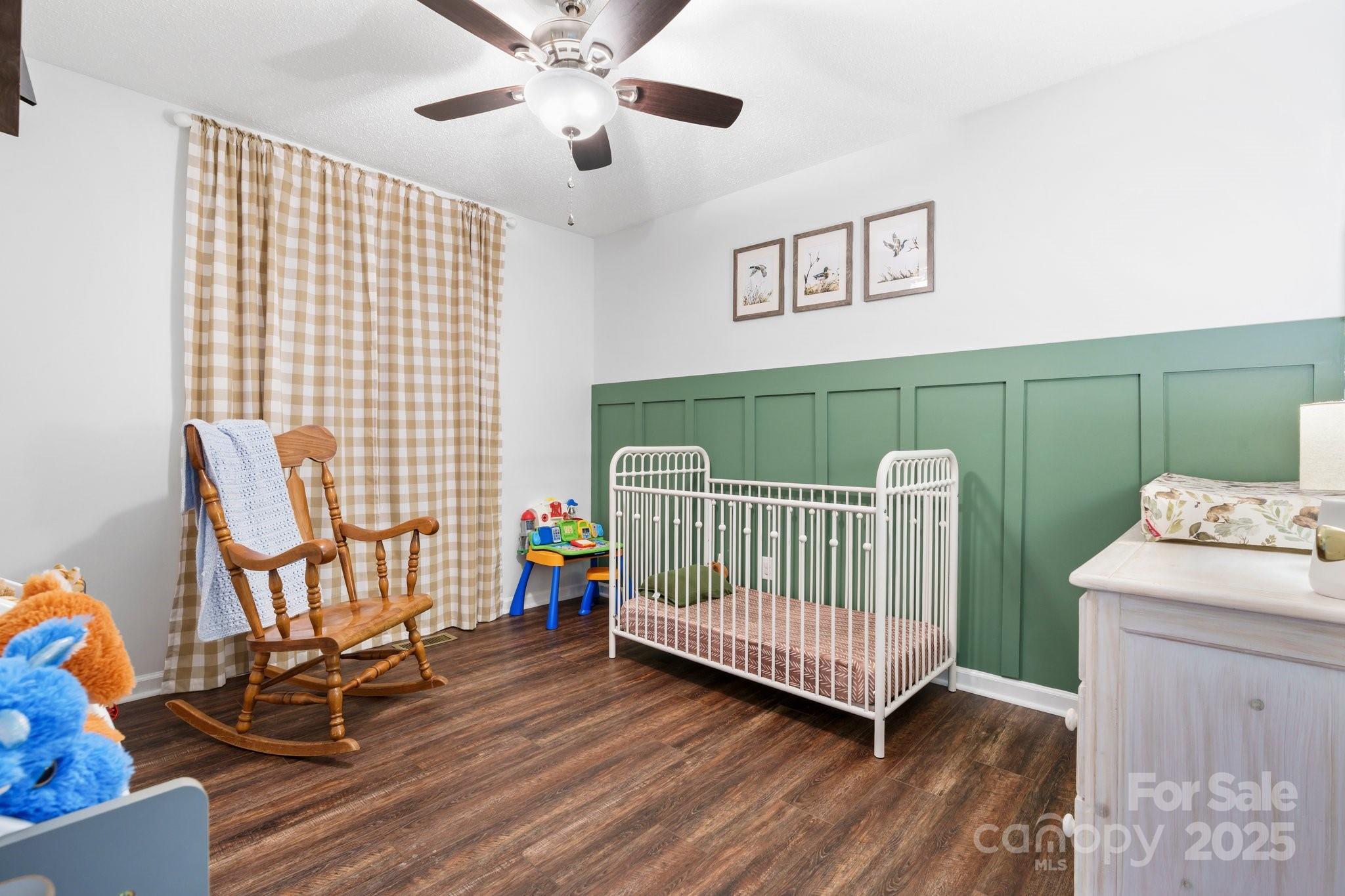 5184 Swinging Bridge Road Conover, NC 28613 - Photo 17 of 38 a view of a room with furniture and wooden floor