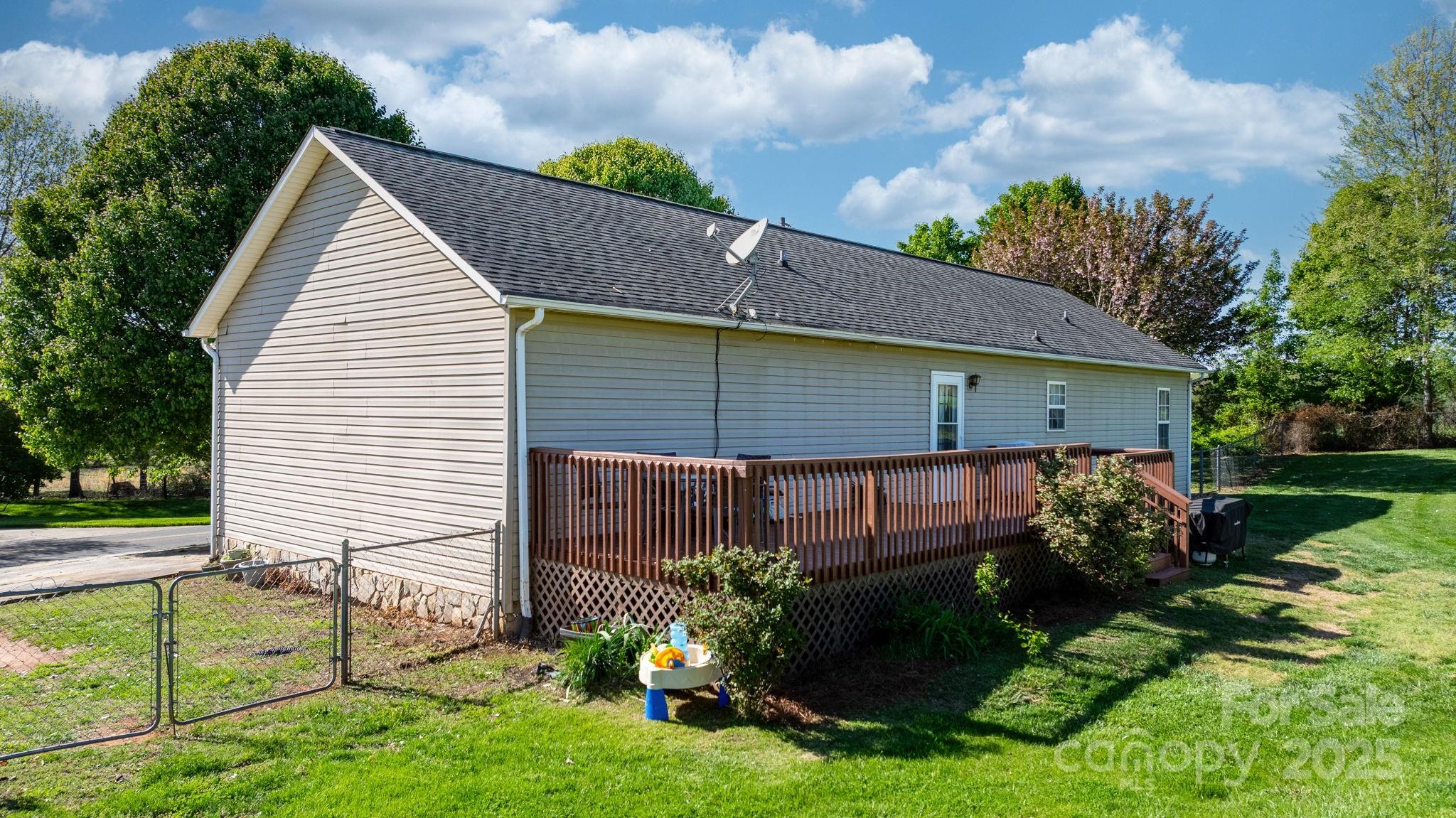 5184 Swinging Bridge Road Conover, NC 28613 - Photo 21 of 38 a view of a house with backyard and garden