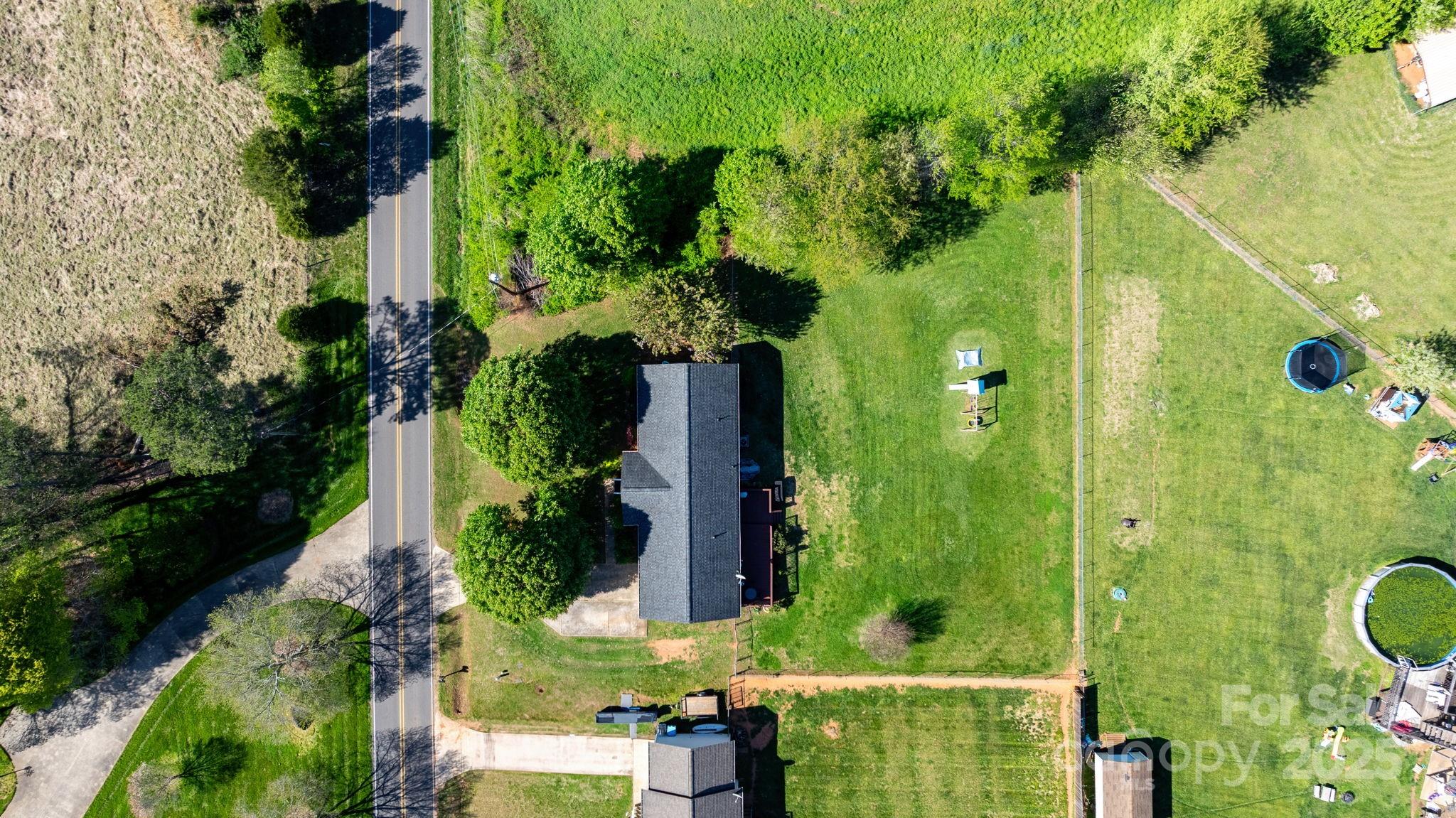 5184 Swinging Bridge Road Conover, NC 28613 - Photo 33 of 38 an aerial view of a house with a yard