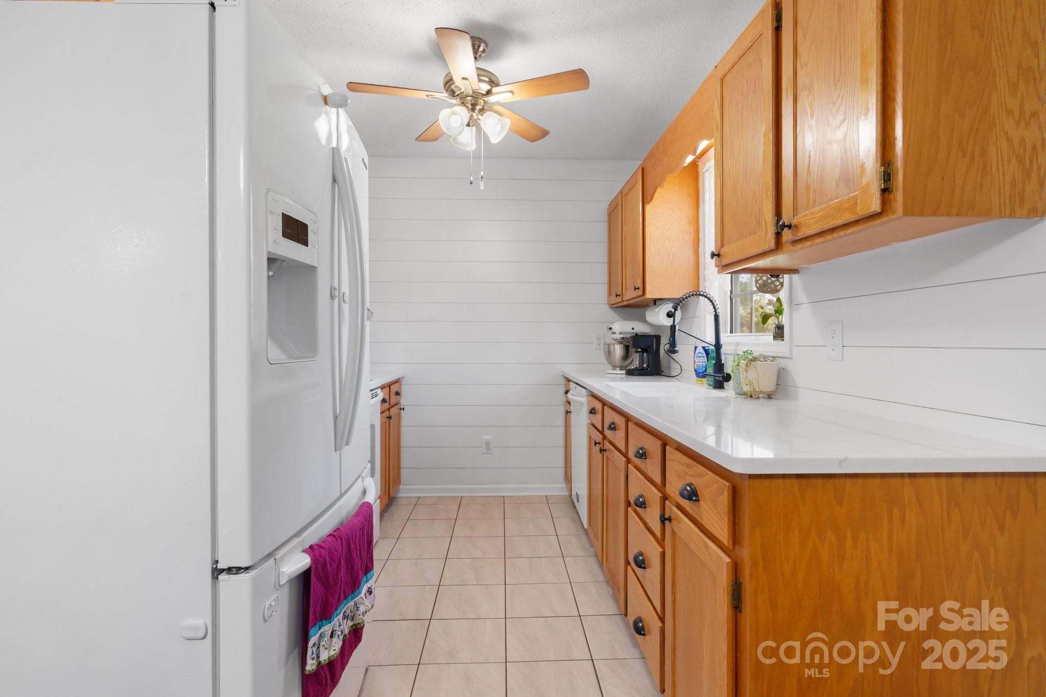 5184 Swinging Bridge Road Conover, NC 28613 - Photo 7 of 38 a bathroom with a sink a mirror and shower