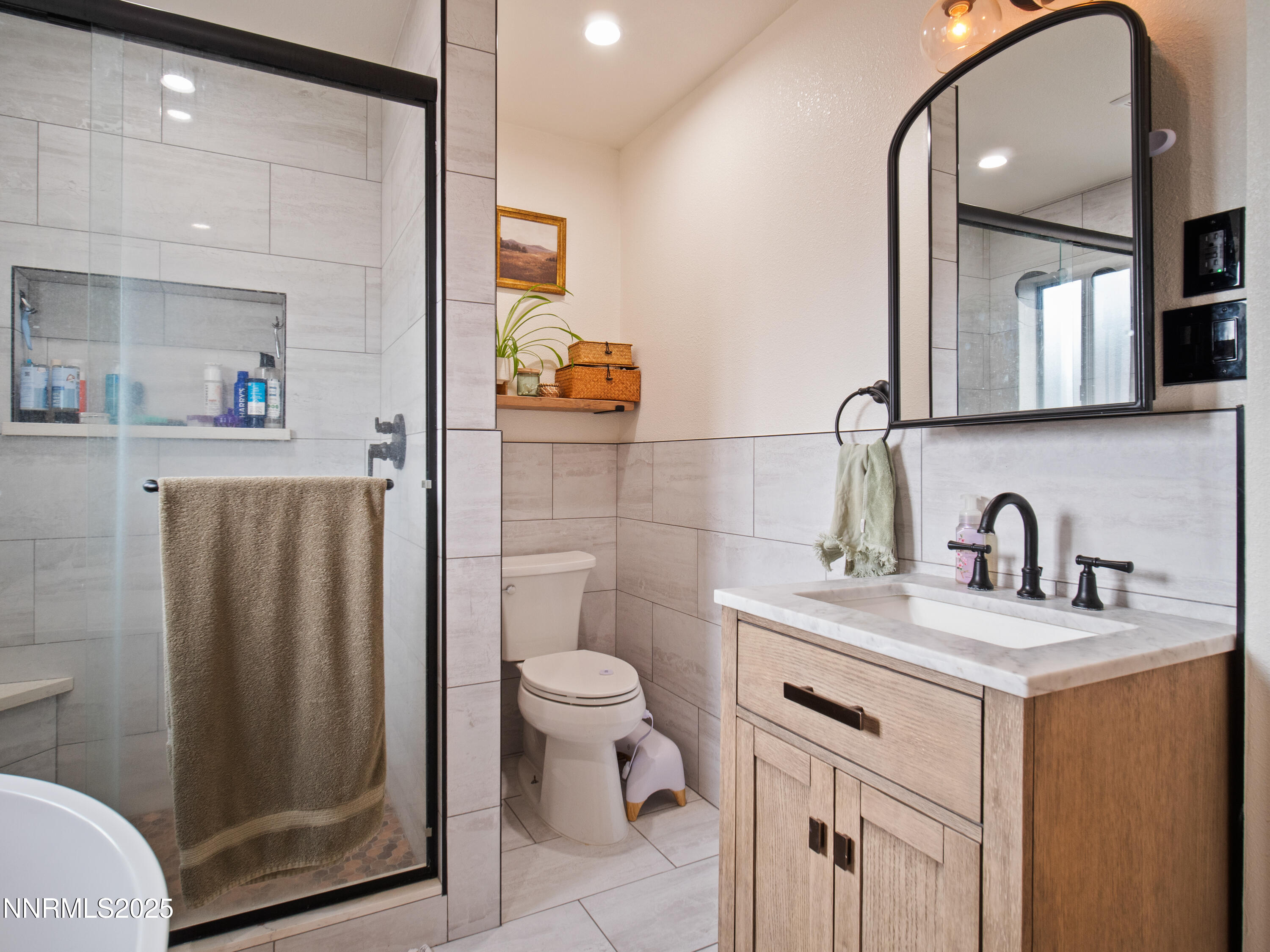 1263 Bronco Circle Minden, NV 89423 - Photo 24 of 33 a bathroom with a sink toilet and shower