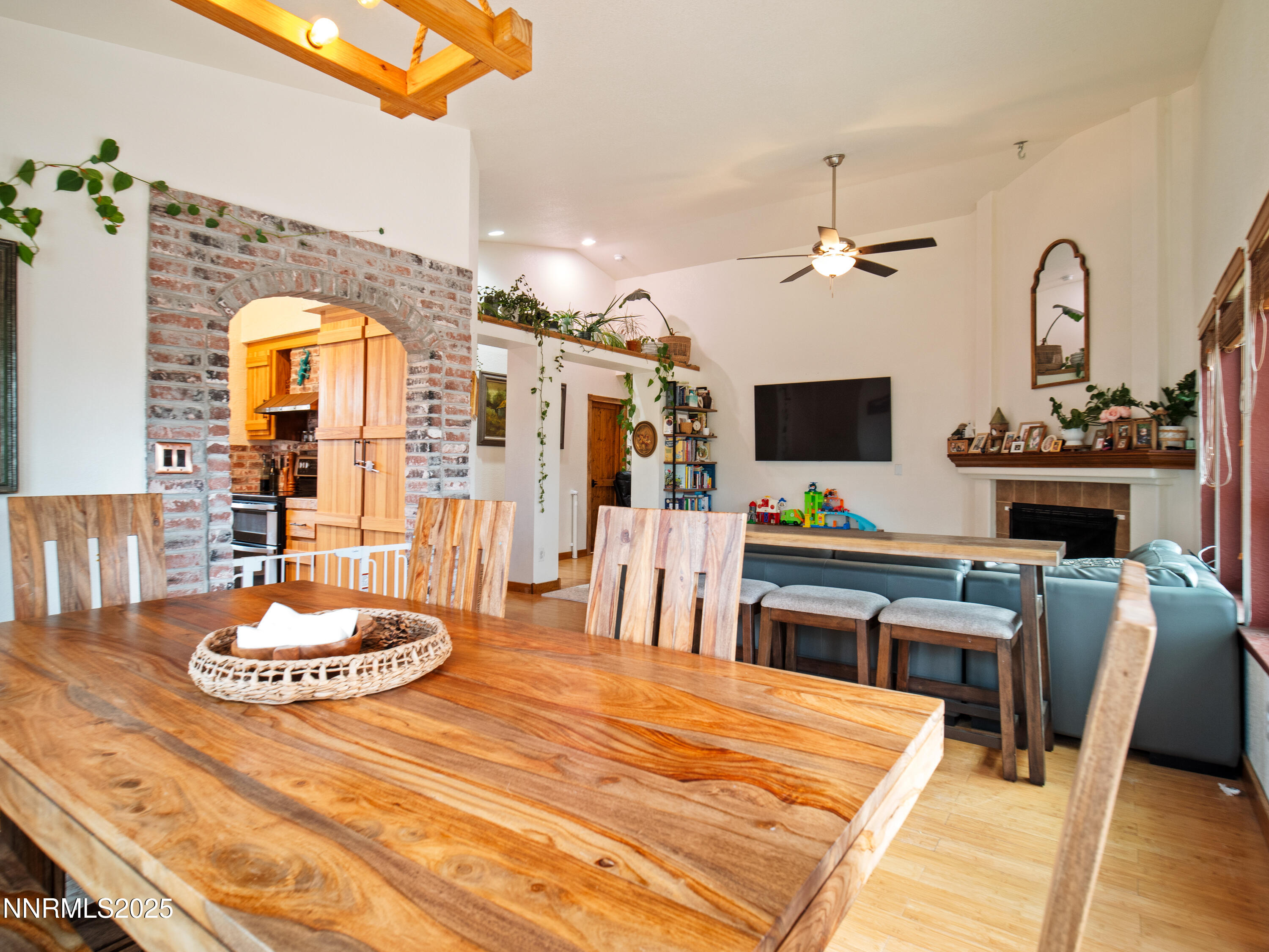 1263 Bronco Circle Minden, NV 89423 - Photo 10 of 33 a bedroom with a table and a flat screen tv