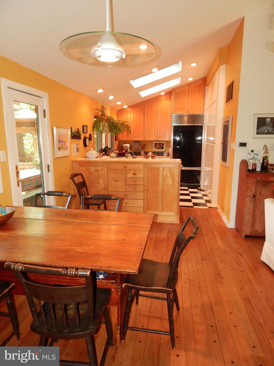 4017 Easterbell Road Port Republic, MD 20676 - Photo 30 of 30 a view of a dining room with furniture and a kitchen view