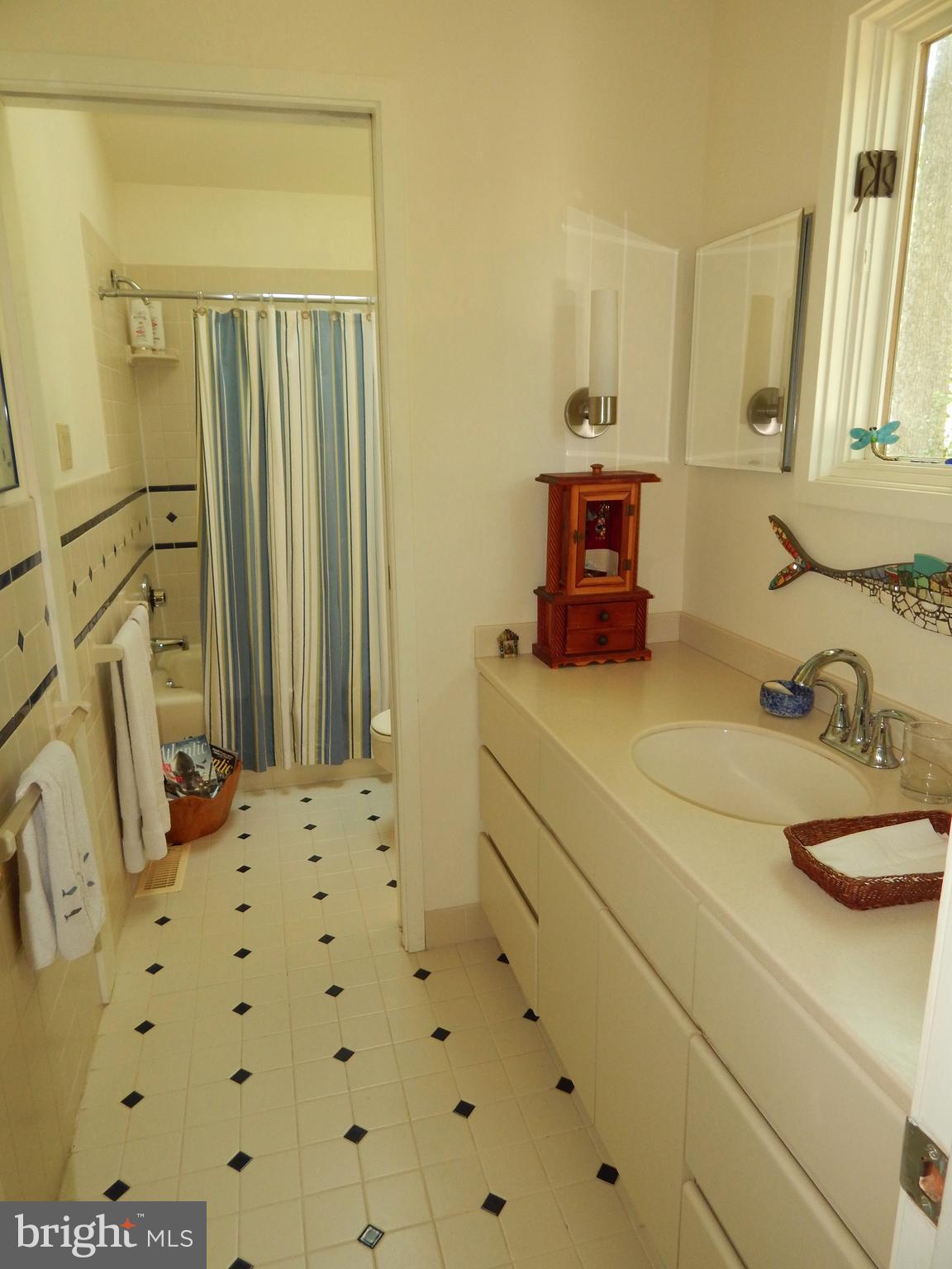 4017 Easterbell Road Port Republic, MD 20676 - Photo 12 of 30 a bathroom with a sink and a mirror