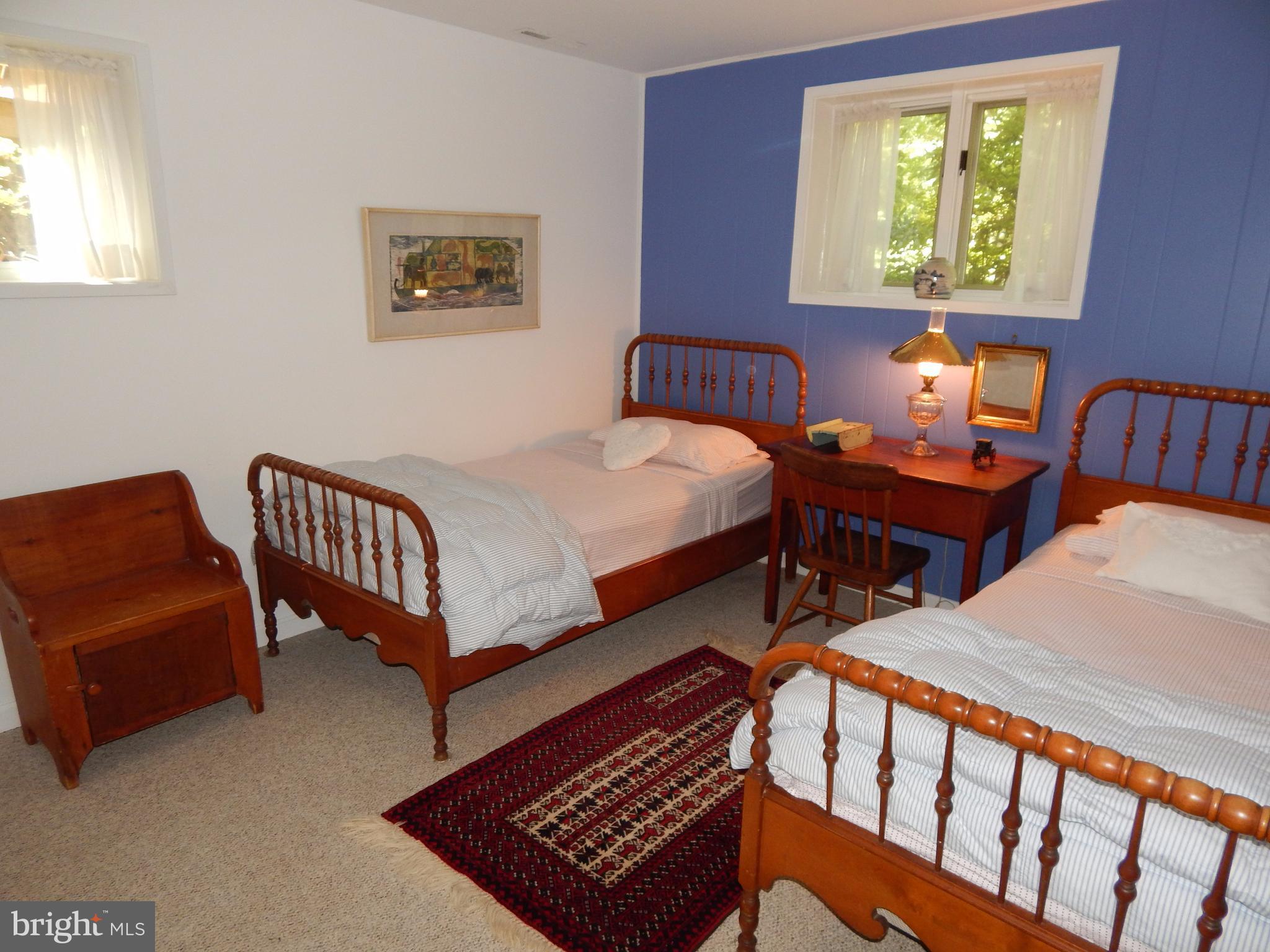 4017 Easterbell Road Port Republic, MD 20676 - Photo 14 of 30 a bedroom with furniture and a window
