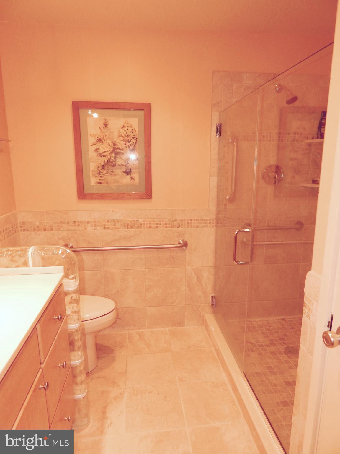 4017 Easterbell Road Port Republic, MD 20676 - Photo 18 of 30 a bathroom with a toilet and a shower