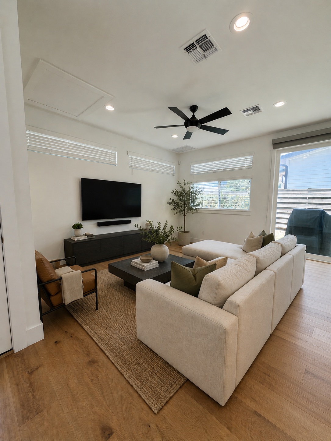 6102 Ponca Street, Unit 2 Austin, TX 78741 - Photo 2 of 24 Living Room Staged with AI
